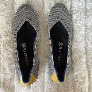 Rothy’s charcoal flats with yellow